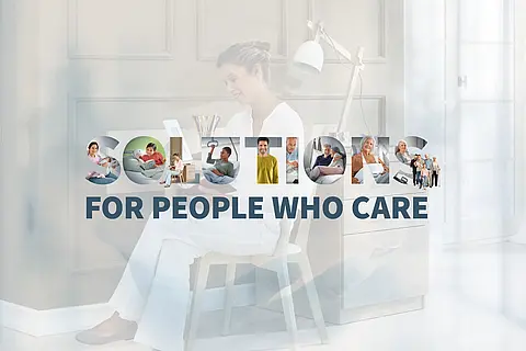 Solutions for People who Care Motyw kampanii firmy Stiegelmeyer przedstawiający kobietę przy biurku oraz hasło „Solutions for people who care”